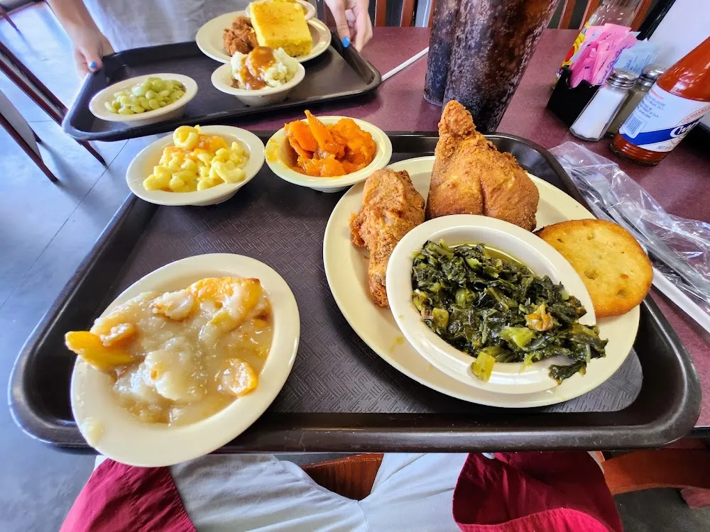 Fried Chicken Mac and Cheese Greens Fried Cornbread Peach Cobbler